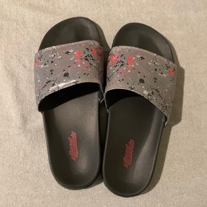 Size 8.5, red, black, and grey sandals/flippers/slides.
